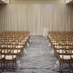 A large room set up for a wedding