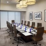 meeting space with a long table and chairs