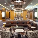 Lobby of Hotel Arundel with chairs and couches to sit